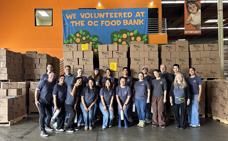 WNC Staff Volunteer to Pack Food Care Boxes for Local Nonprofit